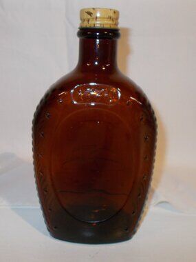 1976 Vintage Log Cabin Syrup Liberty Bell bicentennial bottle, amber color EMPTY